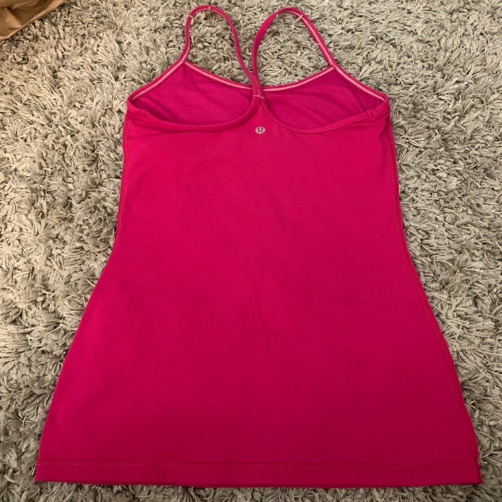 Hot pink lululemon tank top with sport bra installed